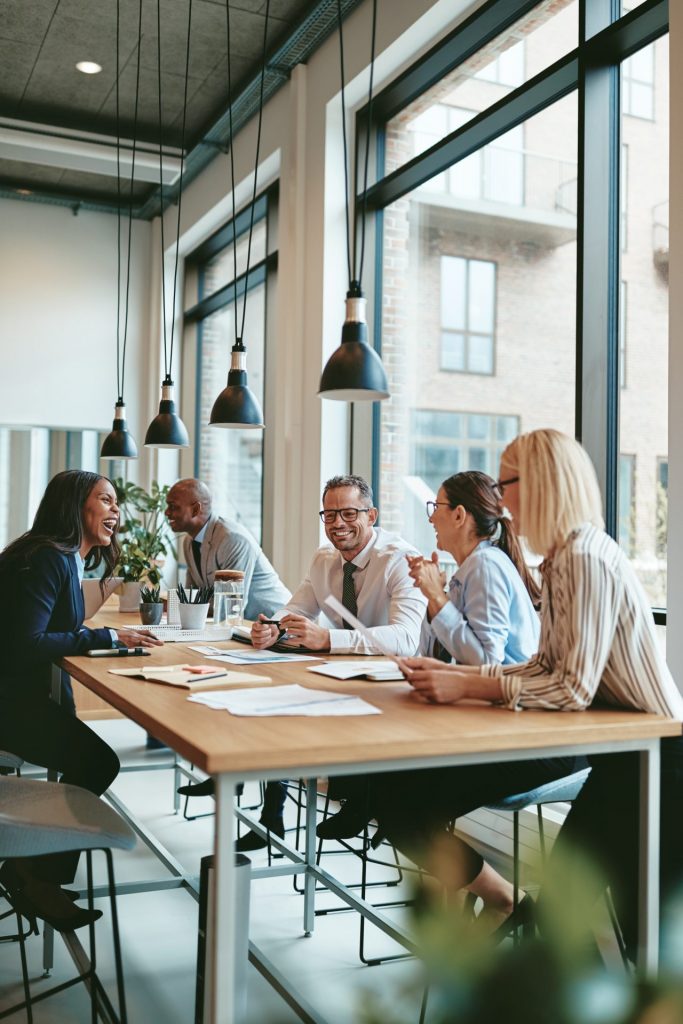 smiling-group-of-diverse-businesspeople-meeting